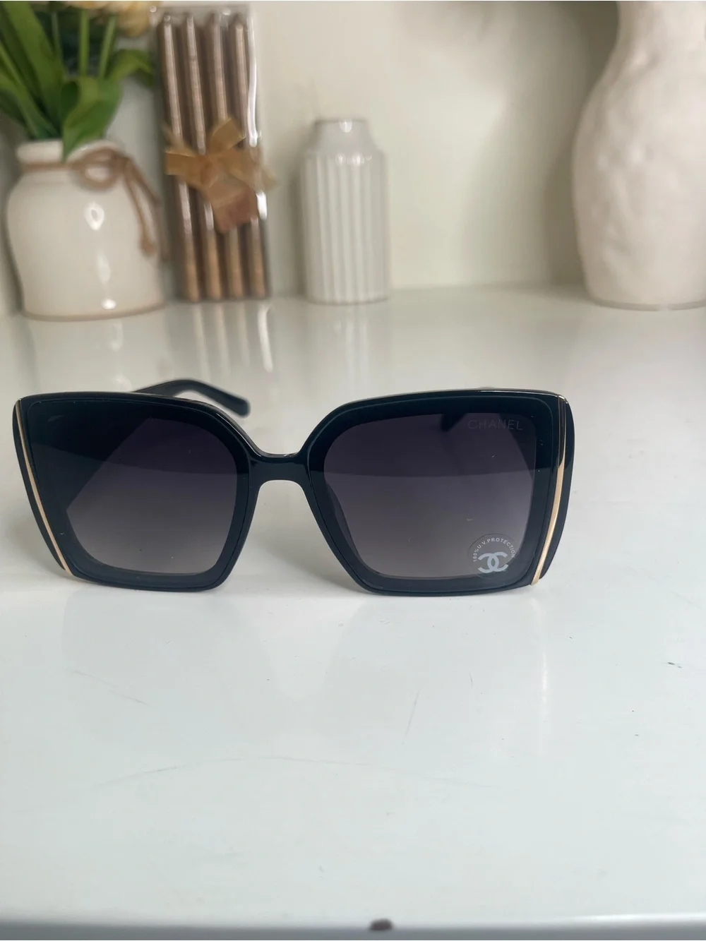 CHANEL Black Sunglasses with Gold Accent